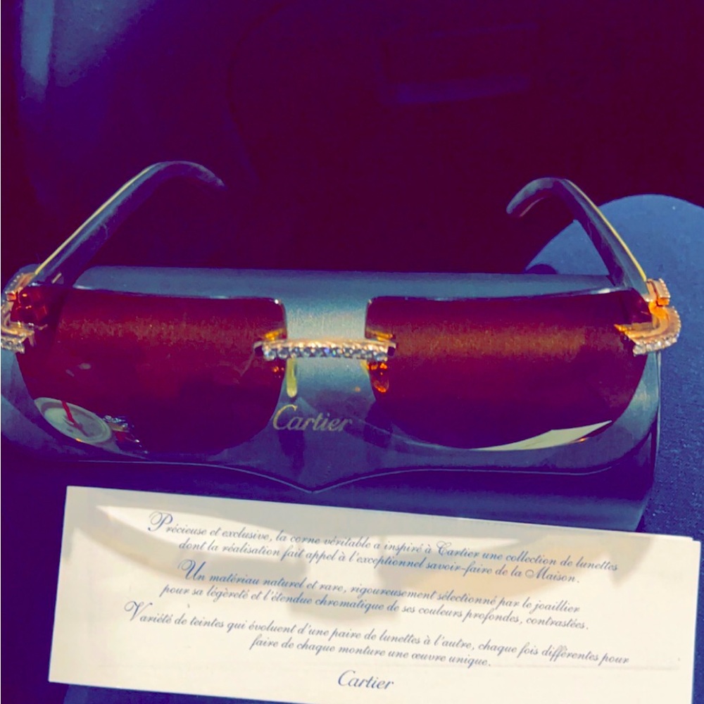 Real authentic diamond studded Cartier glasses purchase made at hutches jeweler